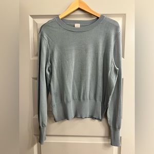 H&M blue sweater with gold accents